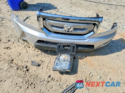 Zdjęcie 13 z 13 samochodu: 2011 HONDA PILOT EX VIN:5FNYF3H42BB049411 - miniatura