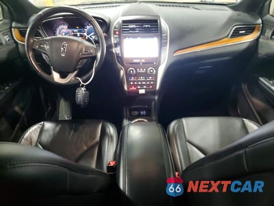 Zdjęcie 8 z 14 samochodu: 2017 LINCOLN MKC SELECT VIN:5LMCJ2D94HUL12365 - miniatura