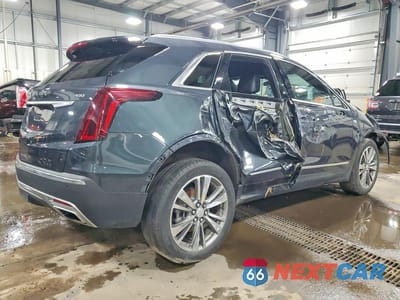 Trzecie zdjęcie samochodu z tyłu: 2021 CADILLAC XT5 PREMIUM LUXURY VIN:1GYKNDRS7MZ149829 - miniatura
