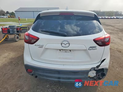 Zdjęcie 6 z 13 samochodu: 2016 MAZDA CX-5 GT VIN:JM3KE4DY9G0918350 - miniatura