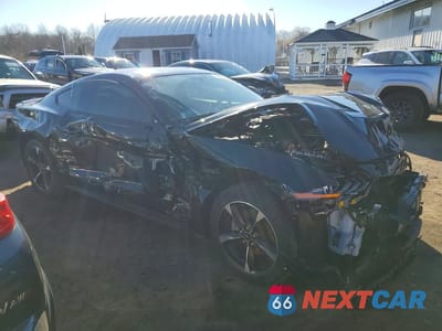 Czwarte zdjęcie samochodu z boku: 2019 FORD MUSTANG VIN:1FA6P8TH3K5142022 - miniatura
