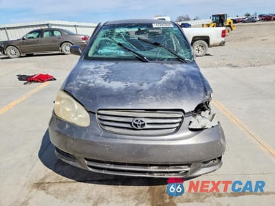 Piąte zdjęcie samochodu w środku: 2003 TOYOTA COROLLA LE VIN:1NZBR32E53Z151711 - miniatura