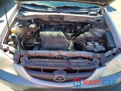 Zdjęcie 12 z 13 samochodu: 2001 MAZDA TRIBUTE LX VIN:4F2YU09151KM33063 - miniatura