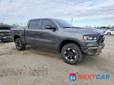 Czwarte zdjęcie samochodu z boku: 2022 RAM 1500 REBEL VIN:1C6SRFLT3NN391069 - miniatura