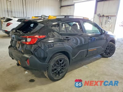 Trzecie zdjęcie samochodu z tyłu: 2024 SUBARU CROSSTREK WILDERNESS VIN:4S4GUHU6XR3791354 - miniatura