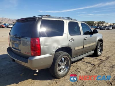 Trzecie zdjęcie samochodu z tyłu: 2009 GMC YUKON SLT VIN:1GKFC33J89R141175 - miniatura