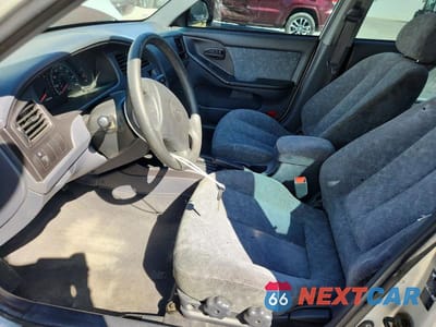 Zdjęcie 7 z 11 samochodu: 2002 HYUNDAI ELANTRA GLS VIN:KMHDN45D32U357864 - miniatura