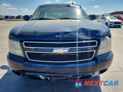 Piąte zdjęcie samochodu w środku: 2010 CHEVROLET SUBURBAN K1500 LS VIN:1GNUKHE3XAR243395 - miniatura