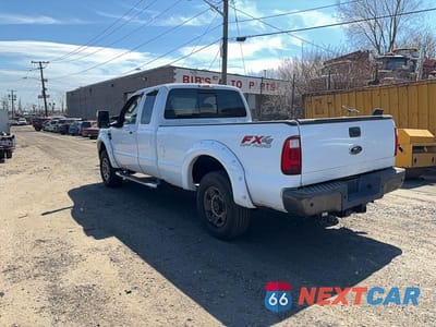 Trzecie zdjęcie samochodu z tyłu: 2009 FORD F250 SUPER DUTY VIN:1FTSX21519EA80483 - miniatura