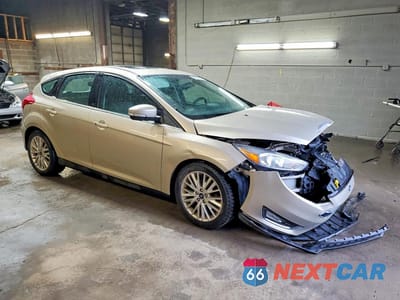 Czwarte zdjęcie samochodu z boku: 2018 FORD FOCUS TITANIUM VIN:1FADP3N27JL232609 - miniatura