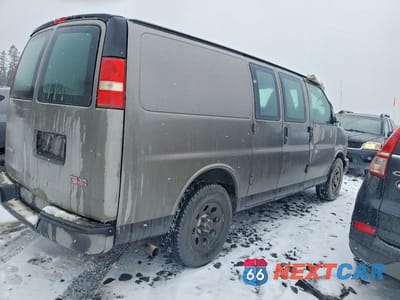 Trzecie zdjęcie samochodu z tyłu: 2012 GMC SAVANA G1500 VIN:1GTS7AFX7C1130452 - miniatura