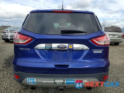 Zdjęcie 6 z 12 samochodu: 2016 FORD ESCAPE TITANIUM VIN:1FMCU0J9XGUB73280 - miniatura