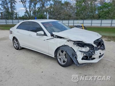 Czwarte zdjęcie samochodu z boku: 2014 MERCEDES-BENZ E 350 VIN:WDDHF5KB7EA802761 - miniatura