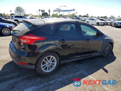 Trzecie zdjęcie samochodu z tyłu: 2018 FORD FOCUS SE VIN:1FADP3K27JL287548 - miniatura