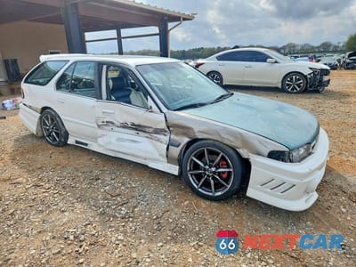 Czwarte zdjęcie samochodu z boku: 1991 HONDA ACCORD LX VIN:1HGCB9858MA023054 - miniatura