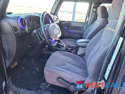 Zdjęcie 7 z 11 samochodu: 2014 JEEP WRANGLER UNLIMITED SAHARA VIN:1C4BJWEG1EL175250 - miniatura