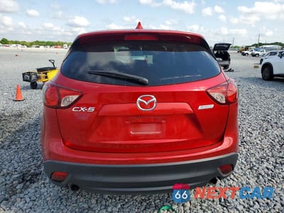 Zdjęcie 6 z 11 samochodu: 2014 MAZDA CX-5 TOURING VIN:JM3KE2CY4E0384371 - miniatura