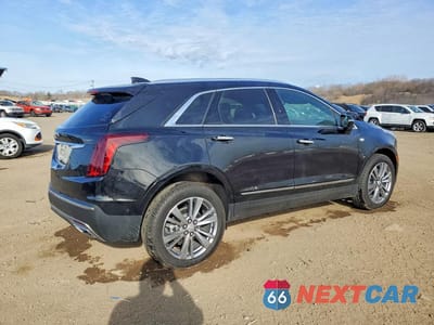 Trzecie zdjęcie samochodu z tyłu: 2026 CADILLAC XT5 PREMIUM LUXURY VIN:1GYKNDR43TZ101602 - miniatura