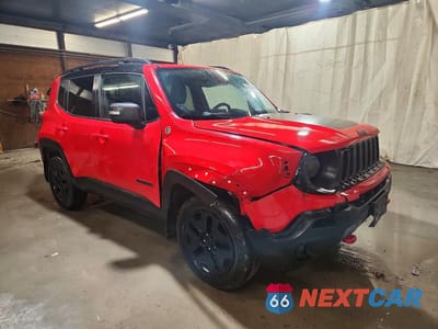 Czwarte zdjęcie samochodu z boku: 2018 JEEP RENEGADE TRAILHAWK VIN:ZACCJBCB0JPH28433 - miniatura