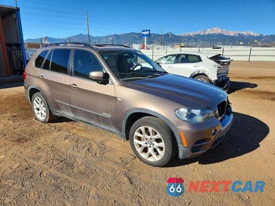 Czwarte zdjęcie samochodu z boku: 2011 BMW X5 XDRIVE35I VIN:5UXZV4C56BL742183 - miniatura