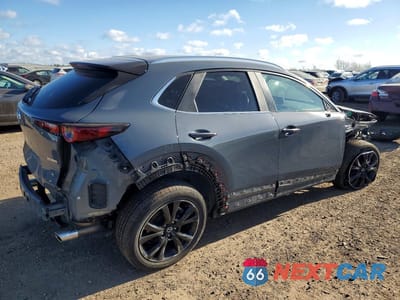 Trzecie zdjęcie samochodu z tyłu: 2022 MAZDA CX-30 PREFERRED VIN:3MVDMBCL1NM422725 - miniatura