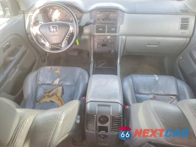 Zdjęcie 8 z 13 samochodu: 2004 HONDA PILOT EXL VIN:2HKYF18514H583954 - miniatura
