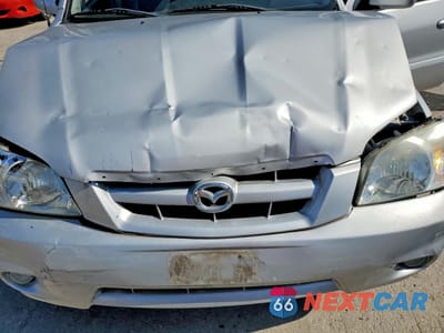 Zdjęcie 12 z 13 samochodu: 2005 MAZDA TRIBUTE S VIN:4F2CZ06175KM49674 - miniatura