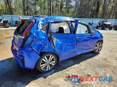 Trzecie zdjęcie samochodu z tyłu: 2016 HONDA FIT EX VIN:JHMGK5H70GX006470 - miniatura
