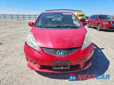 Piąte zdjęcie samochodu w środku: 2009 HONDA FIT SPORT VIN:JHMGE88429S066023 - miniatura