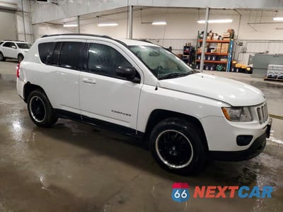 Czwarte zdjęcie samochodu z boku: 2011 JEEP COMPASS VIN:1J4NF1FB3BD263818 - miniatura