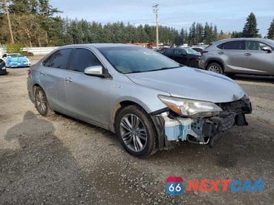 Czwarte zdjęcie samochodu z boku: 2015 TOYOTA CAMRY HYBRID SE VIN:4T1BD1FK2FU151205 - miniatura
