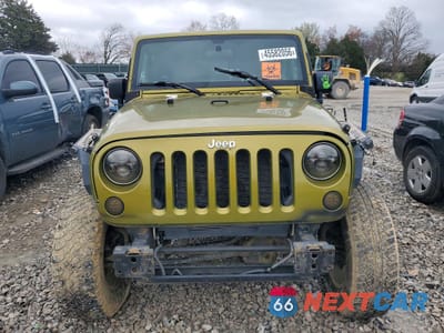 Piąte zdjęcie samochodu w środku: 2010 JEEP WRANGLER UNLIMITED SAHARA VIN:1J4BA5H19AL203012 - miniatura