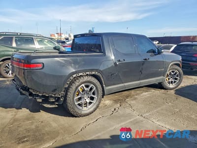Trzecie zdjęcie samochodu z tyłu: 2022 RIVIAN R1T LAUNCH EDITION VIN:7FCTGAAL1NN009723 - miniatura