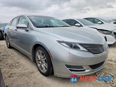 Czwarte zdjęcie samochodu z boku: 2016 LINCOLN MKZ HYBRID VIN:3LN6L2LU7GR624718 - miniatura