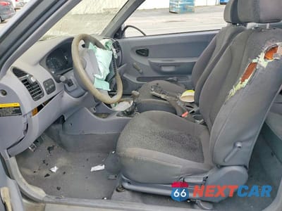 Zdjęcie 7 z 11 samochodu: 2004 HYUNDAI ACCENT BASE VIN:KMHCF35C54U299849 - miniatura