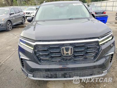 Zdjęcie 12 z 13 samochodu: 2023 HONDA PILOT TOURING VIN:5FNYG2H74PB014250 - miniatura