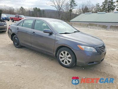 Czwarte zdjęcie samochodu z boku: 2007 TOYOTA CAMRY HYBRID BASE VIN:JTNBB46KX73027293 - miniatura