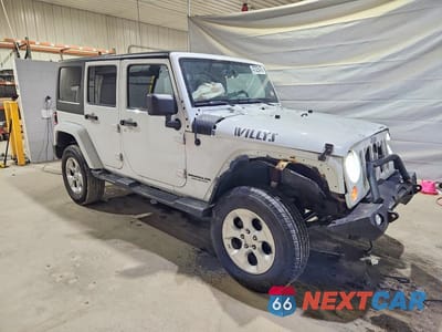 Czwarte zdjęcie samochodu z boku: 2015 JEEP WRANGLER SPORT VIN:1C4BJWDG3FL556536 - miniatura