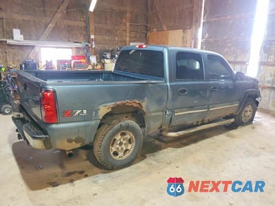 Trzecie zdjęcie samochodu z tyłu: 2007 CHEVROLET SILVERADO K1500 CLASSIC CREW CAB VIN:2GCEK13Z271104052 - miniatura