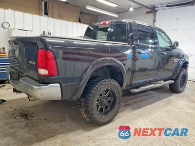 Trzecie zdjęcie samochodu z tyłu: 2016 RAM 1500 SLT VIN:3C6RR7LT4GG136463 - miniatura