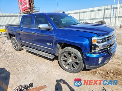 Czwarte zdjęcie samochodu z boku: 2018 CHEVROLET SILVERADO K1500 HIGH COUNTRY VIN:3GCUKTEJ4JG317467 - miniatura