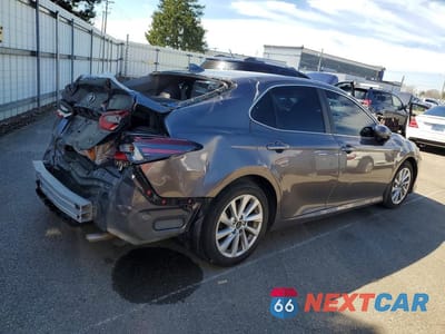 Trzecie zdjęcie samochodu z tyłu: 2024 TOYOTA CAMRY LE VIN:4T1C11AK7RU203534 - miniatura