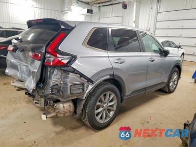 Trzecie zdjęcie samochodu z tyłu: 2023 HONDA CR-V EX VIN:7FARS4H41PE010519 - miniatura