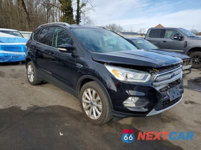 Czwarte zdjęcie samochodu z boku: 2017 FORD ESCAPE TITANIUM VIN:1FMCU9JD5HUC53659 - miniatura