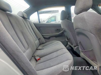 Zdjęcie 10 z 13 samochodu: 2006 HYUND ELANTRA VIN:KMHDN46D06U334451 - miniatura