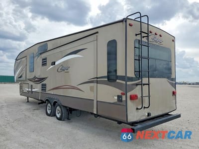 Trzecie zdjęcie samochodu z tyłu: 2015 KEYSTONE COUGAR RV VIN:4YDF33325F2508197 - miniatura