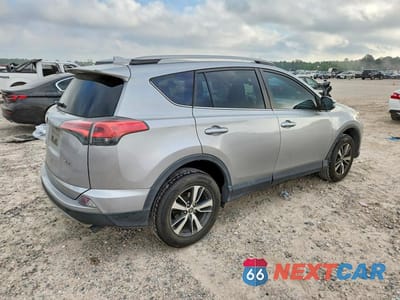 Trzecie zdjęcie samochodu z tyłu: 2018 TOYOTA RAV4 XLE VIN:2T3WFREV7JW477099 - miniatura