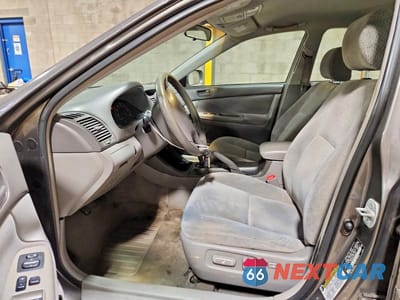 Zdjęcie 7 z 12 samochodu: 2004 TOYOTA CAMRY LE VIN:4T1BE32K64U909655 - miniatura