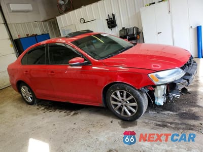 Czwarte zdjęcie samochodu z boku: 2012 VOLKSWAGEN JETTA SE VIN:3VWDP7AJ6CM323450 - miniatura