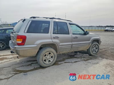 Trzecie zdjęcie samochodu z tyłu: 1999 JEEP GRAND CHEROKEE LIMITED VIN:1J4GW68N1XC671972 - miniatura
